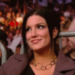 Gina Carano eyebrow shug/bite lip/smile irresistible combo