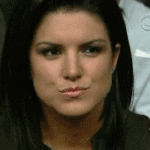 Gina Carano pierced tongue, sexy smile, and bite lip